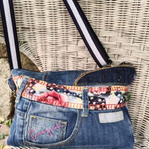 Bolso clutch flor denim